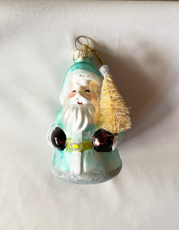 vintage green coat glass santa holding a white brush tree christmas ornament