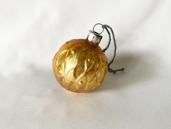 Vintage Corning glass Christmas ornament bumpy gold round diamond, circa 1940s USA.