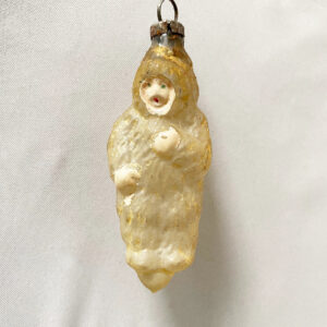 Antique german unsilvered figural glass christmas ornament child in a snowsuit, flesh face, excellent condition.