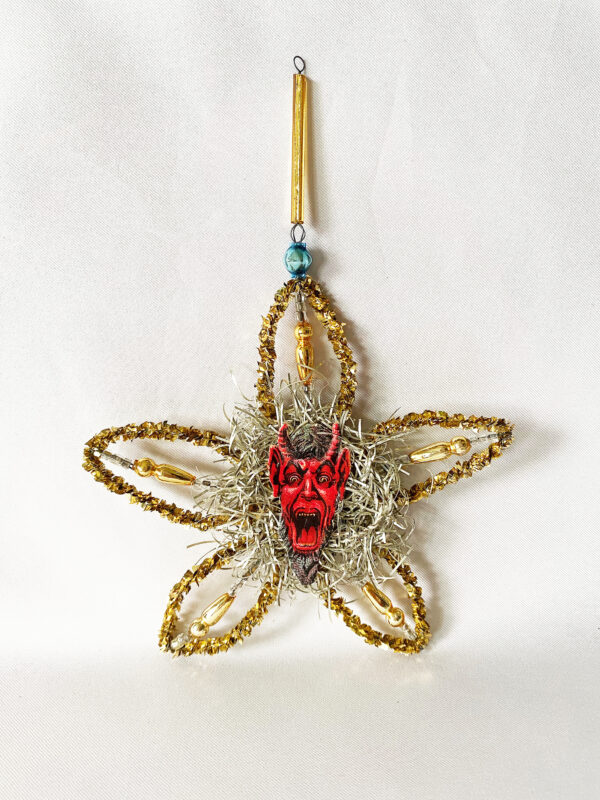 vintage Krampus devil christmas ornament Czech gold beaded tinsel star two sided laughing and angry Krampus paper scrap