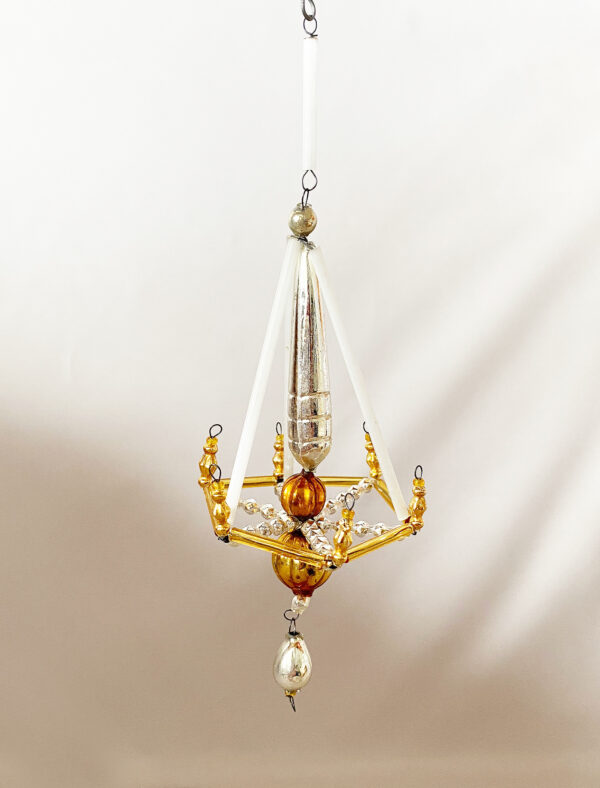 Silver and gold antique Czech beaded christmas ornament, a 5 inch tall chandelier lamp with eight styles of glass beads, circa 1920s.